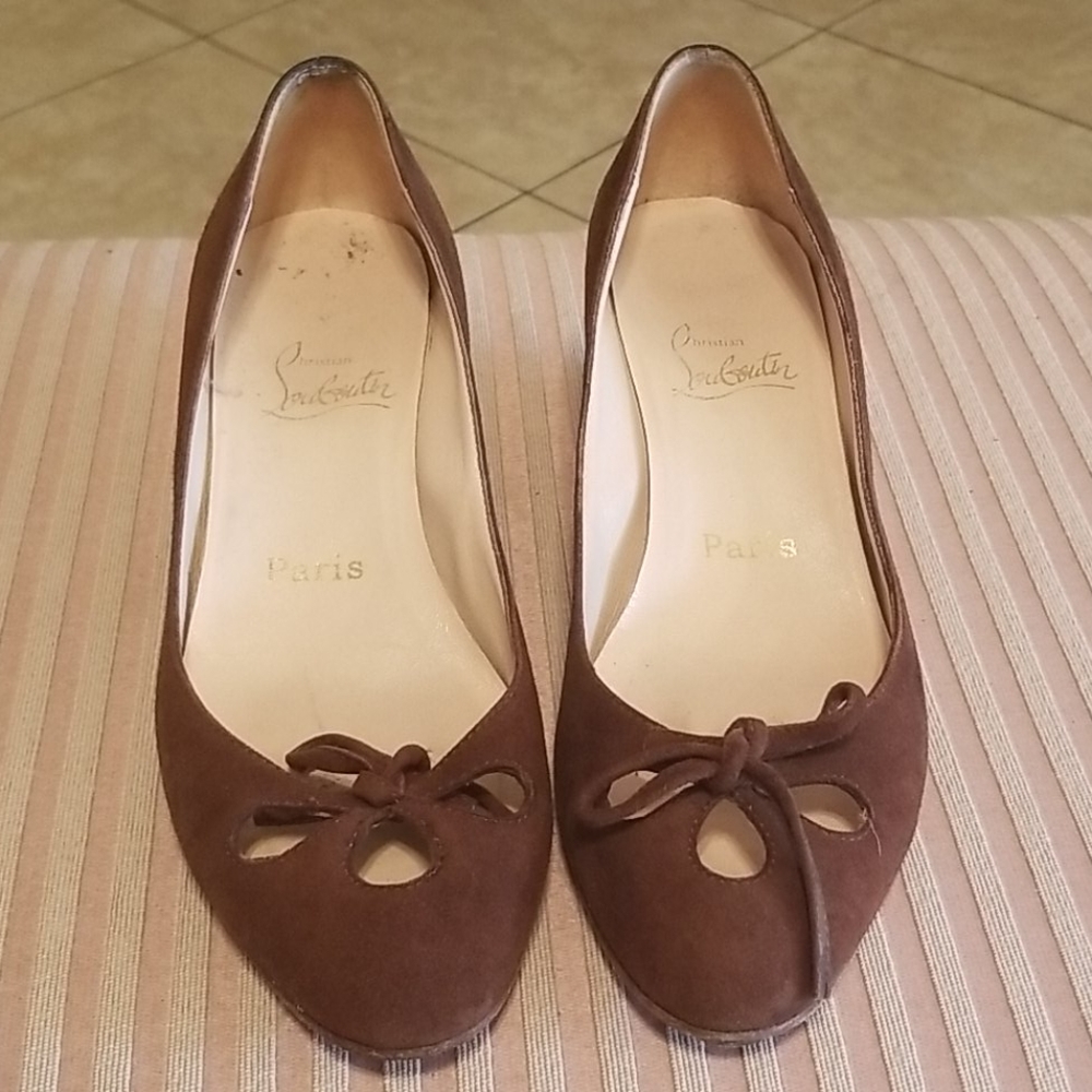 Authentic Christian Louboutin raised heel shoes